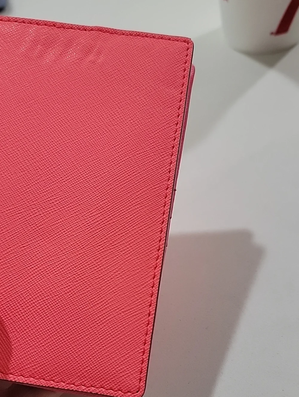 kate spade coral Talk The Talk Imogene Passport Holder Featuring Parrot